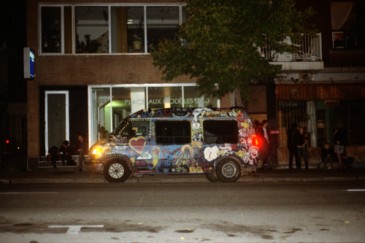 Hollerado's van parked in front of a popular party spot, the Nacho House.