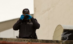 Police officer taking photos