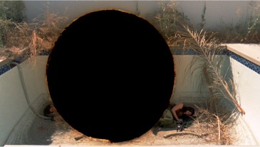 Black Moon/Hole Punch Number 9 (2010) by Amie Siegel