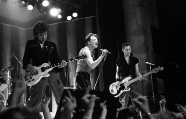 The Looters performing at PNE Gardens on set. Left to right: Steve Jones (guitarist of the Sex Pistols); Ray Winstone (actor, Quadrophenia); Paul Simonon (bassist of the Clash) | | photo by Bev Davies