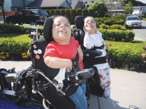 Deepi Leihl, left, with twin sister, Jotti. Photo by Alan Campbell/Richmond News.